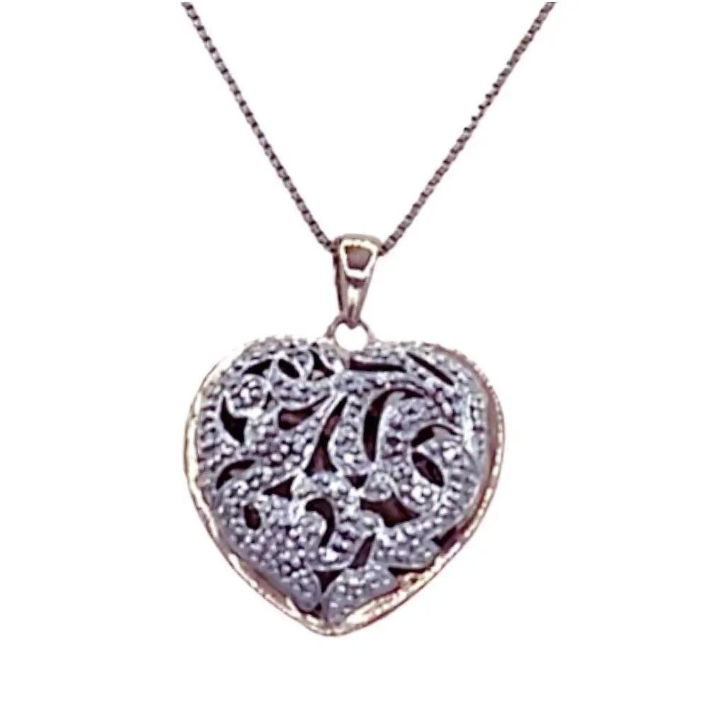 Puffy heart 2 sides cut out design sterling silver Vermeil .